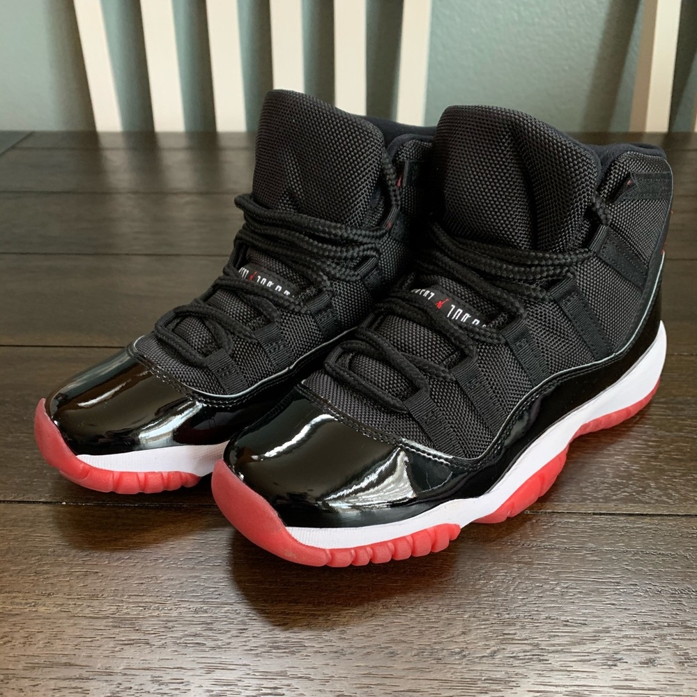 Black and red Bred 11s